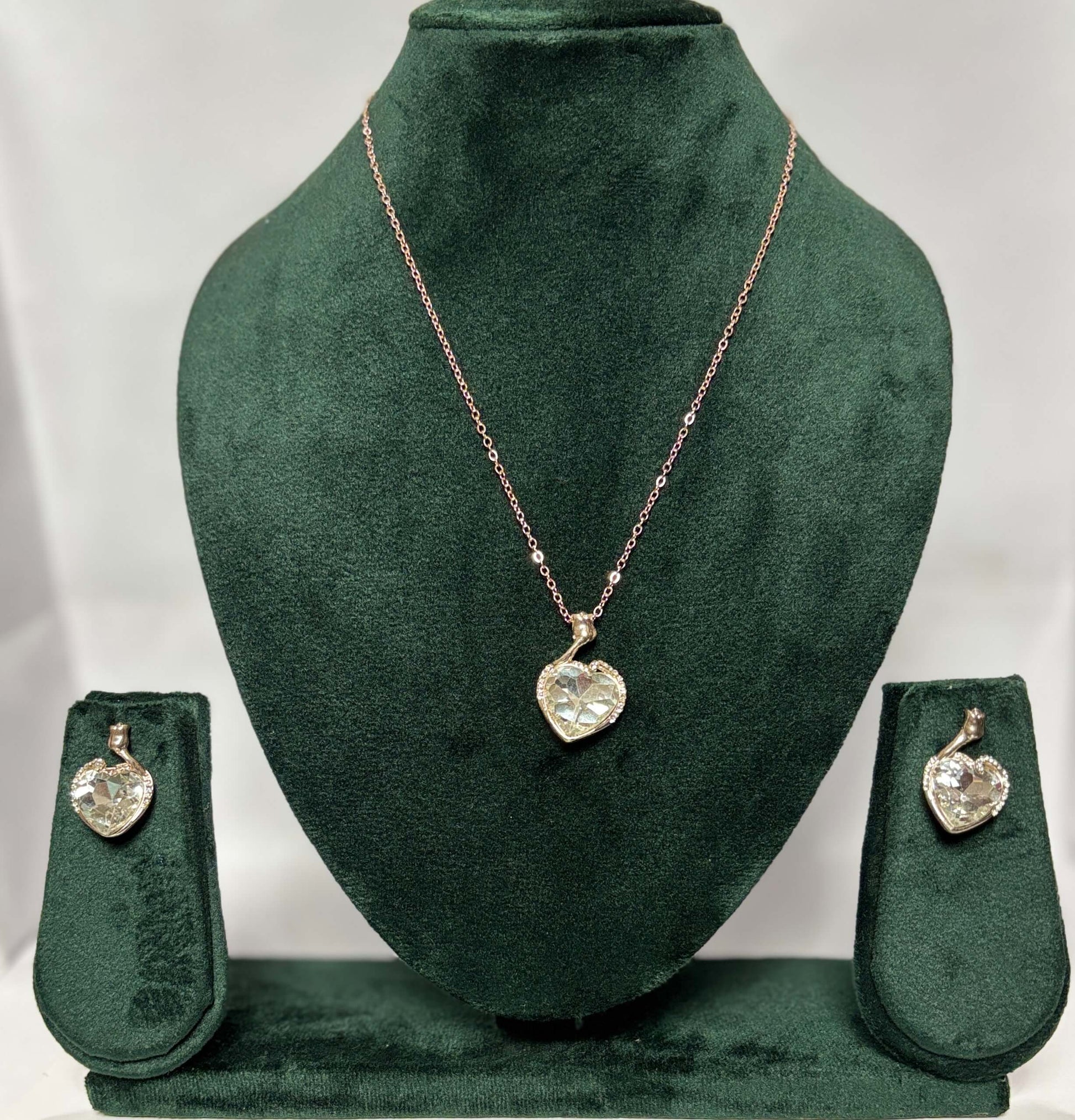Jewelry set with heart-shaped pendant and earrings 