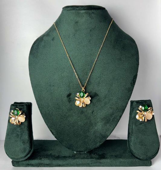 Gold necklace with green gemstones 