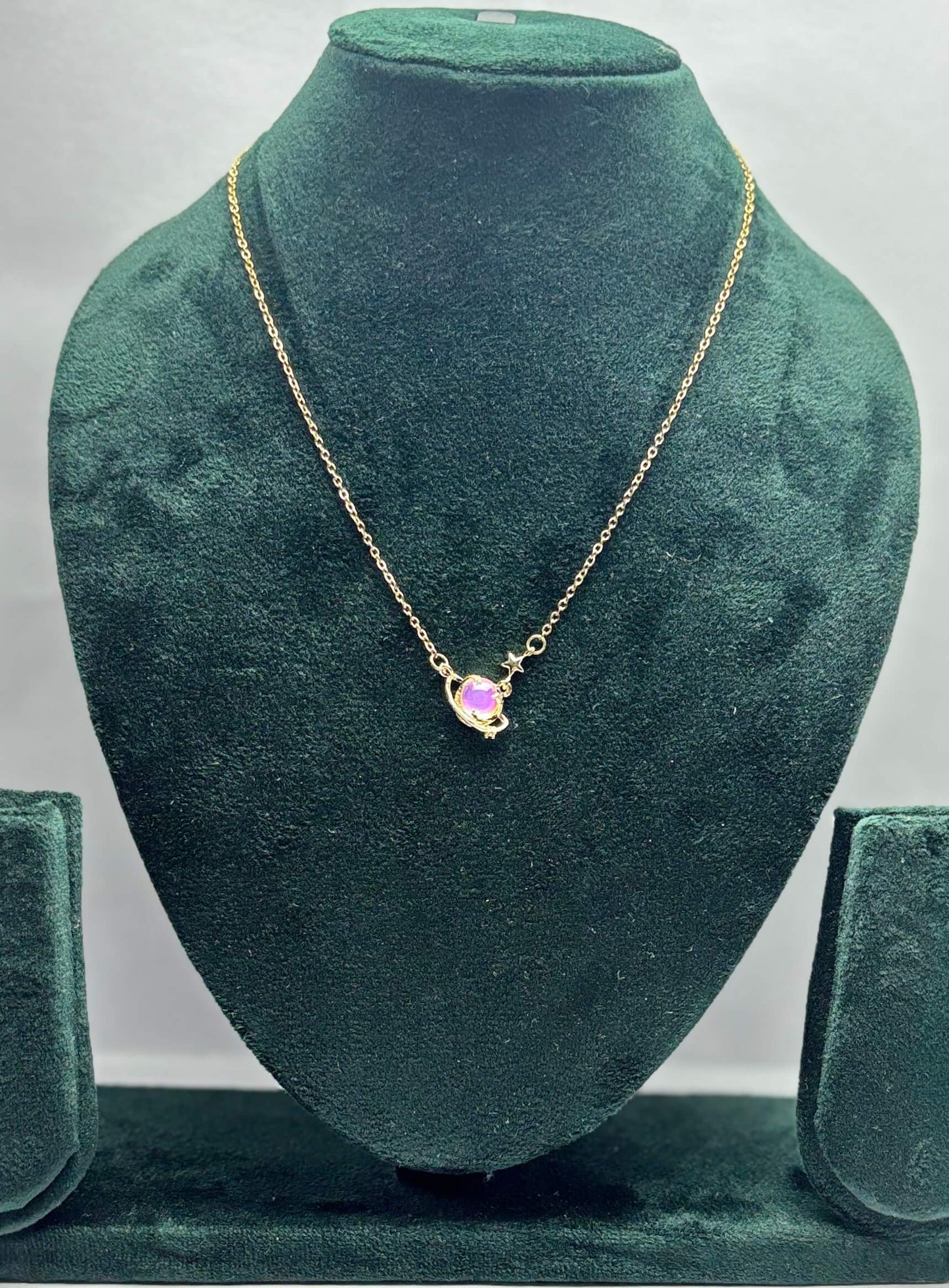 Gold plated neckpiece with a multicolor gemstone
