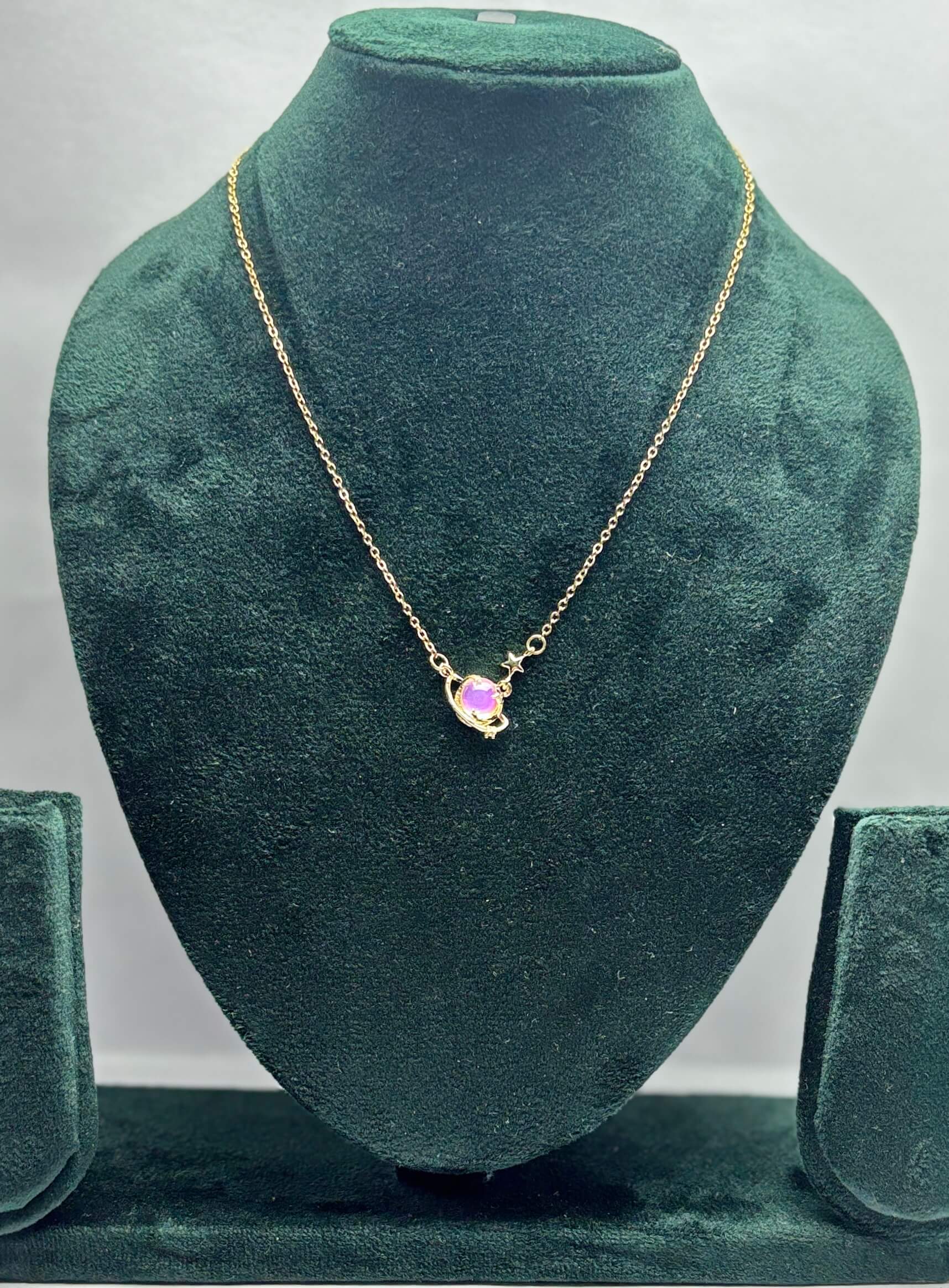 Gold plated neckpiece with a multicolor gemstone