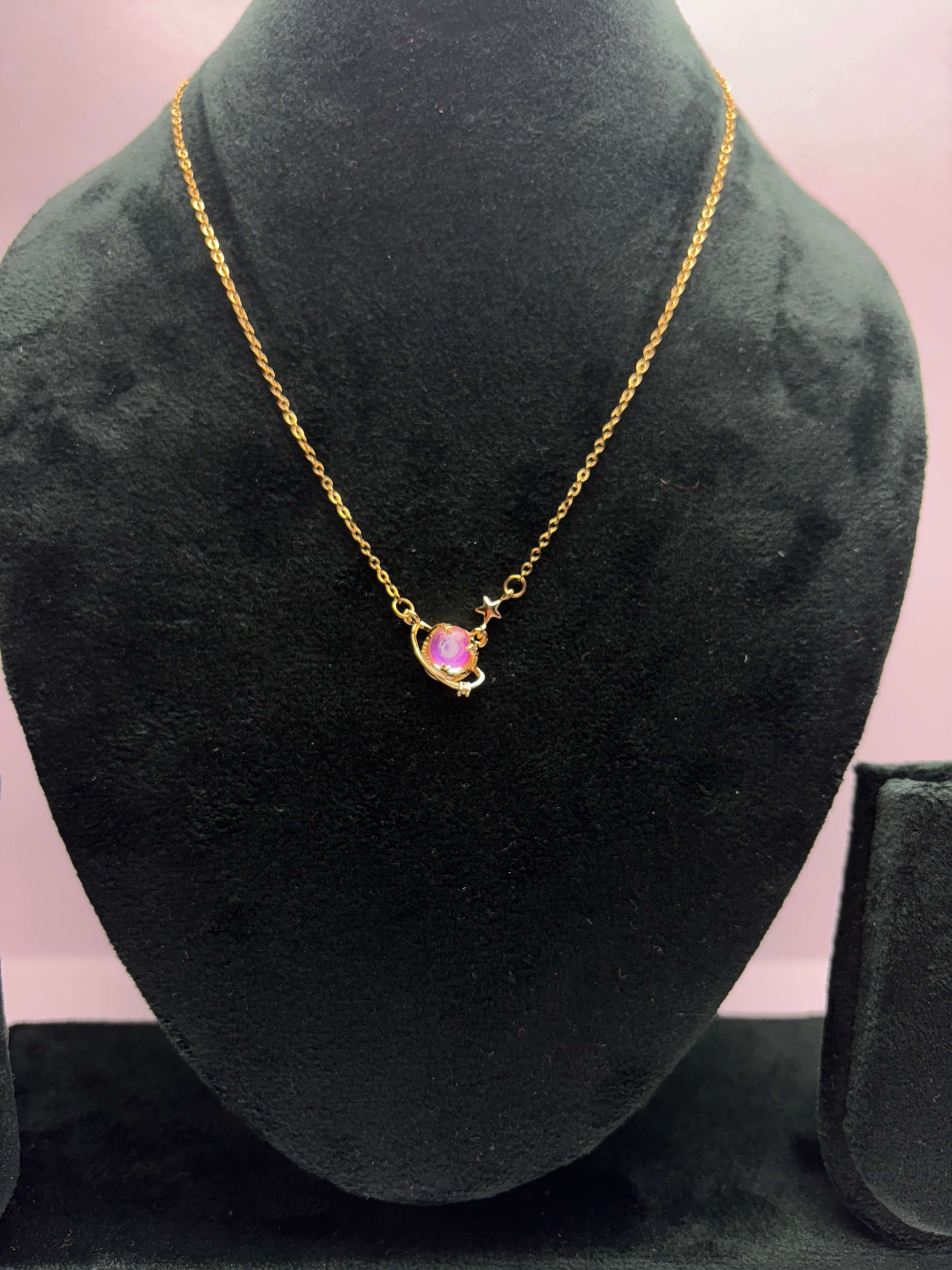 Gold plated neckpiece with a multicolor gemstone