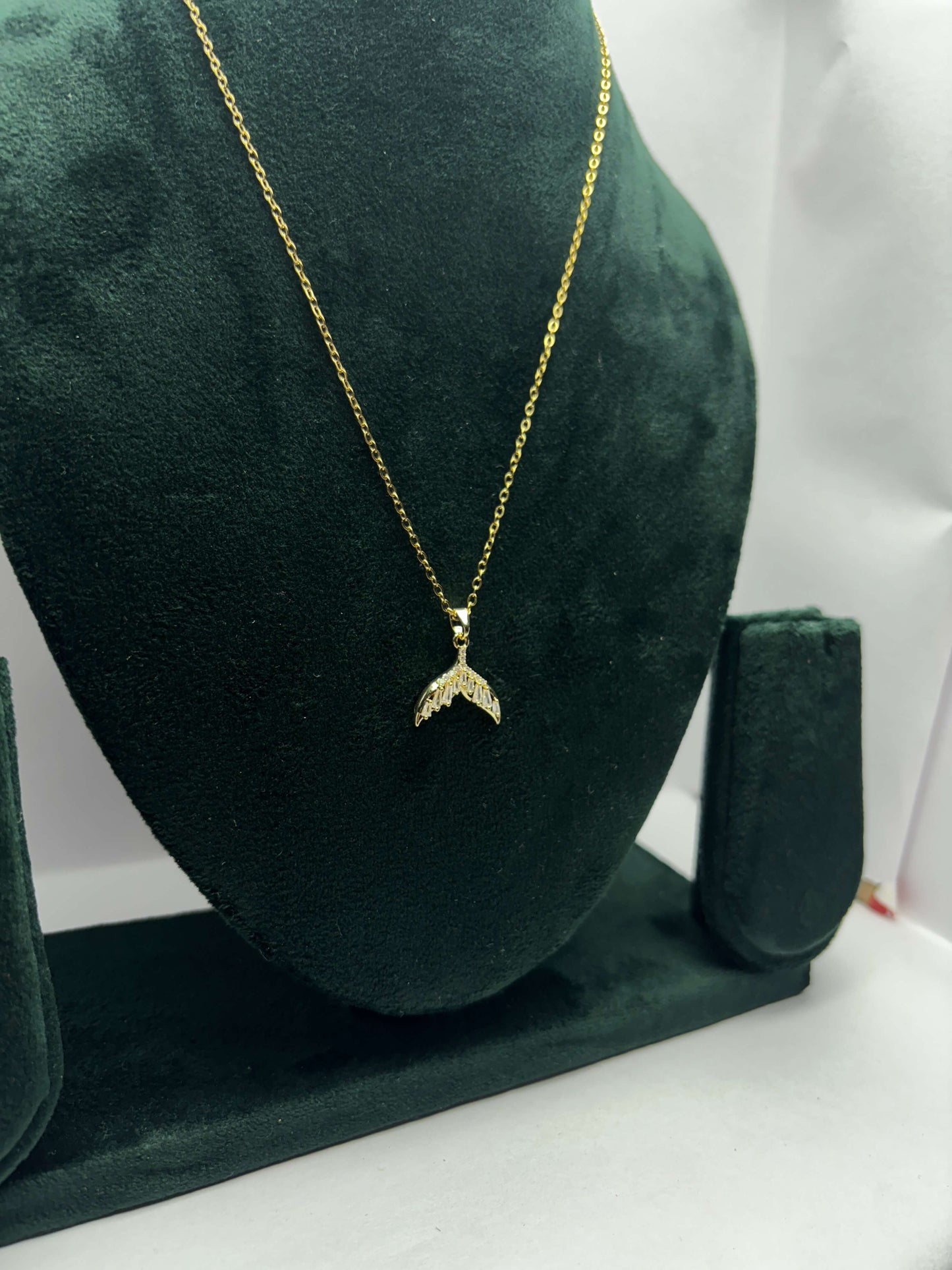 Necklace with mermaid tail pendant