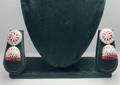 pair of silver oxidized jhumka with red beads