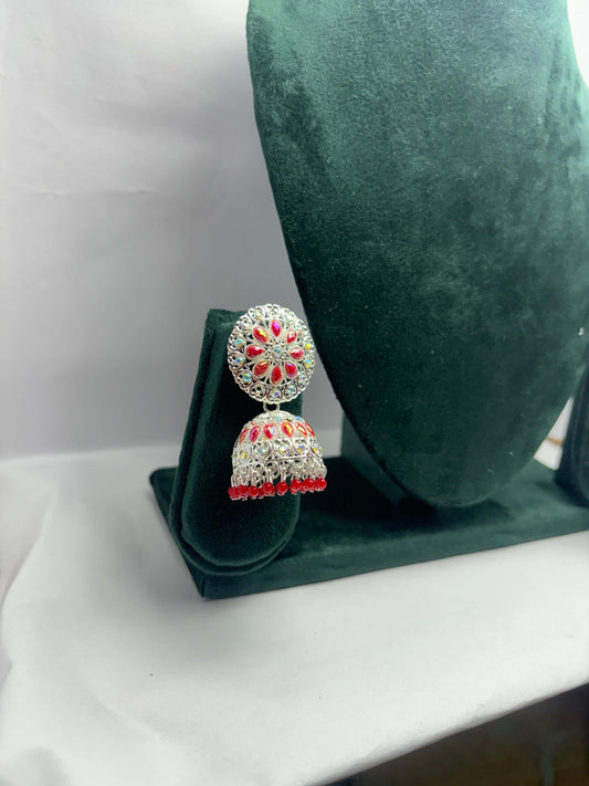pair of silver oxidized jhumka with red beads