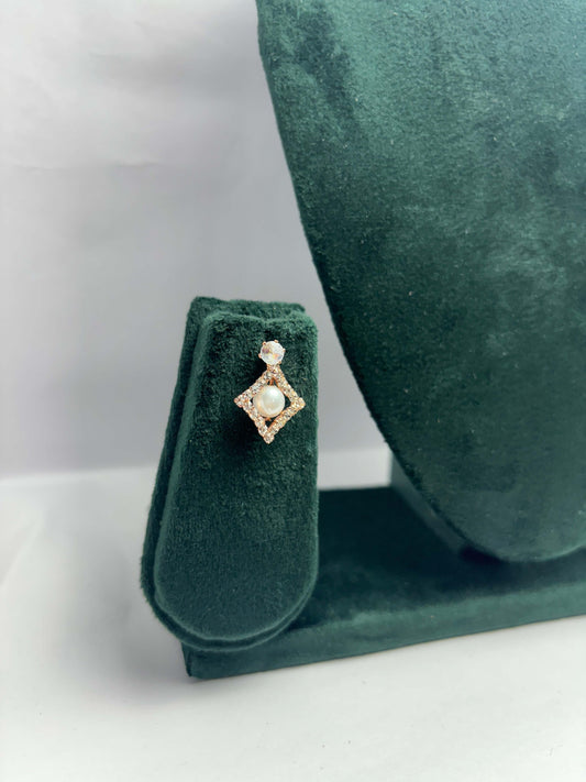 Pair of diamond shaped white pearl earrings 