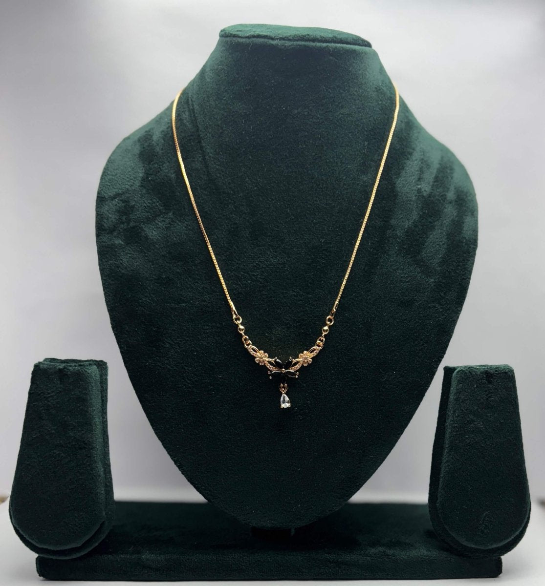 Elegant Gold-Tone Floral Pendant Necklace | Party Wear & Ethnic Jewelry | AureyaAUREYA FASHIONClearadjustable chain necklace